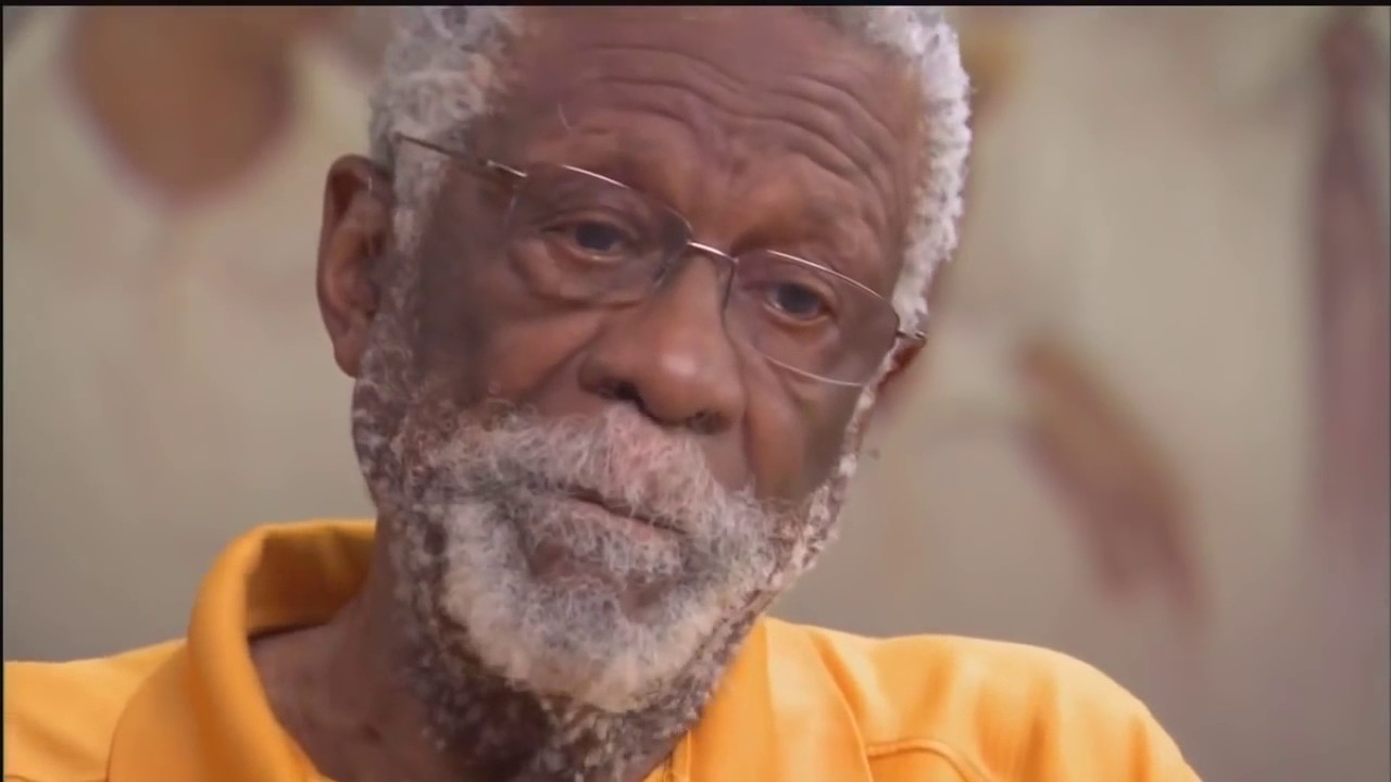 how old was bill russell when he retired